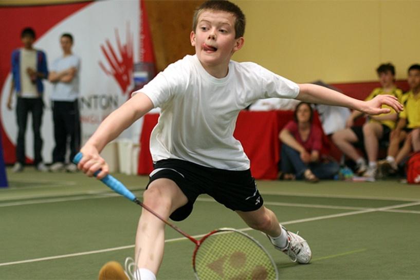 Junior badminton match action training