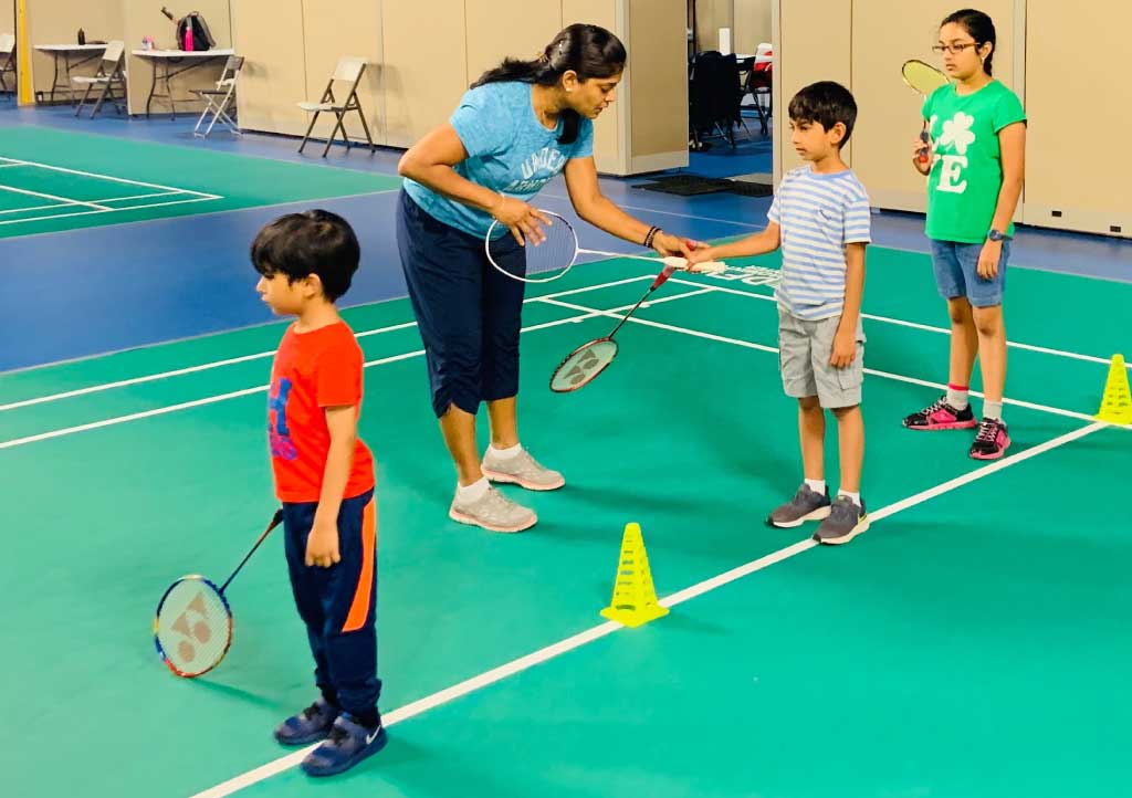 Kids badminton coaching session